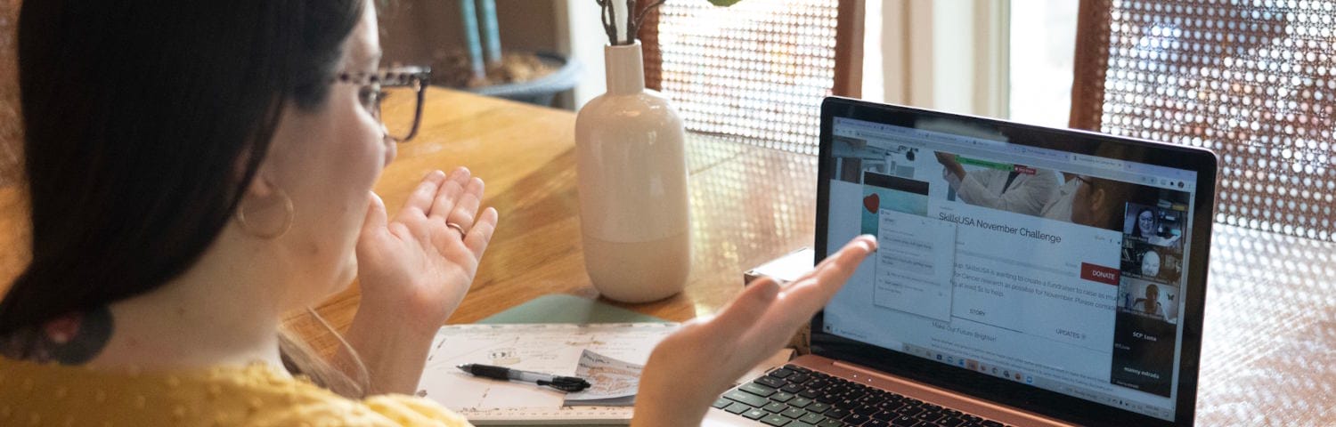 Student attending to an online class at home